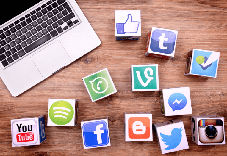 21 Ways to Repurpose Content with social media logos on top of blocks.