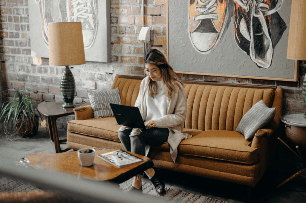 Lady on computer creating a business email for her business. Keep reading to learn easy local seo marketing for your blog.