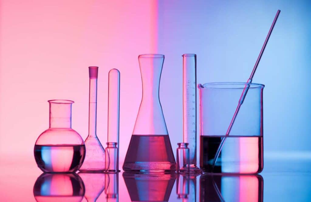 Science flasks and utensils representing how the scientific method can be used to test your conversion methods such as with A/B testing. Learn more about conversion rate optimization for your blog.