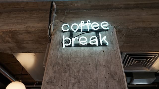 Neon sign that reads: coffee break