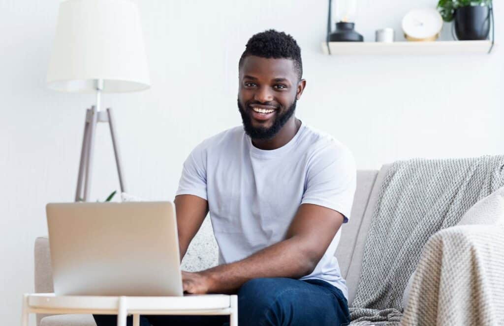 A man working on email marketing so he can monetize his blog from day one. Keep reading to learn tips so you can make money blogging.