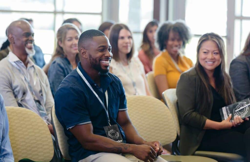 A group of people at a blogging conference. If you have ever asked "What's the point of blogging?" click here to read more.