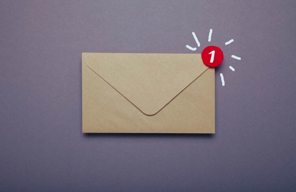 A light brown envelope with a red alert with the number 1 on the top right side showing there is one unread email. Keep reading to learn more about how you can increase website conversions.