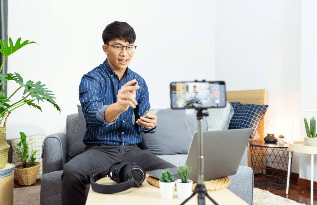 A man trying to decide if he wants to blog or create videos. Keep reading to learn the answer to the question, "Is Blogging Still Relevant?"