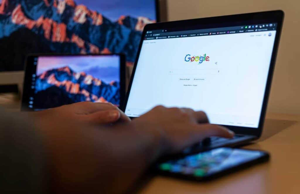 A man using Google as he does a technical SEO audit on his website. Read more to learn how to do a technical site audit after the Google update and learn more about the future of Blogging here.