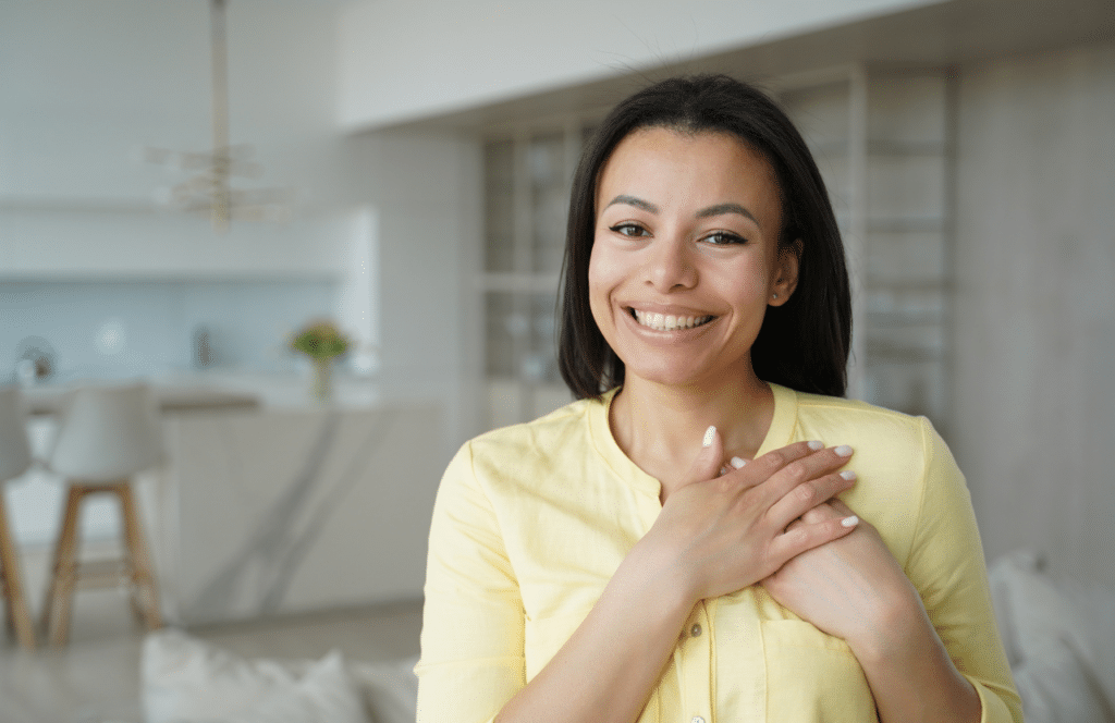 A woman showing appreciation to a blogger for providing valuable information that builds trust. Keep reading to learn the answer to the question, "Is Blogging Still Relevant?"