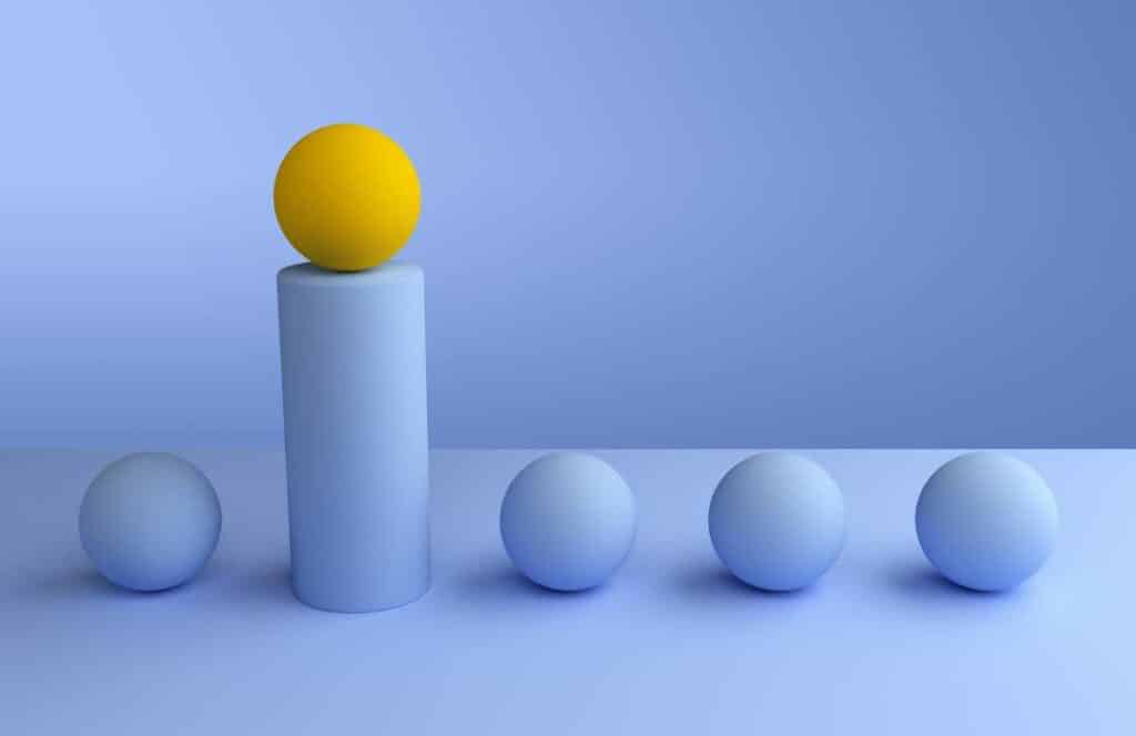 Five balls with all but the second one is blue and lifted on a pillar to signify the best options for marketing online with a blog. Click here to learn how to write a blog post in 30 minutes.