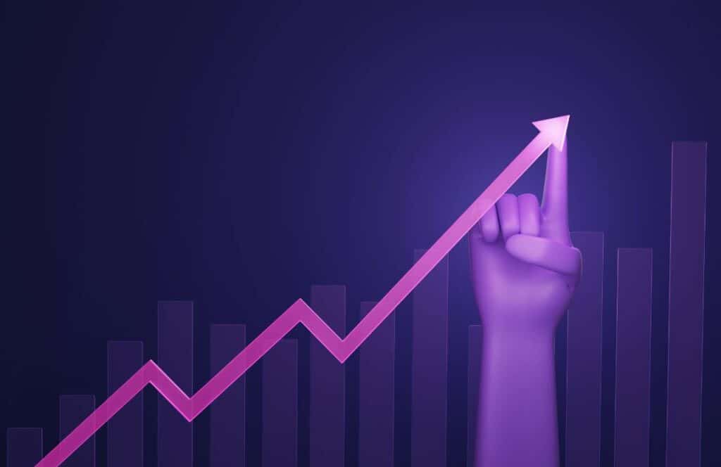 A hand tracing a line graph up to show scalability and growth when using ai blog writers.