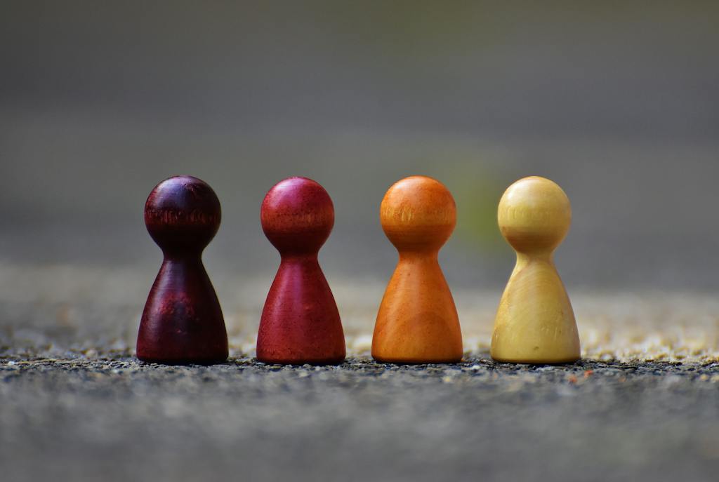 Focus Photo of 4 Wooden Pawn Figurine. Keep reading to learn about the other best insurance affiliate marketing programs available for bloggers and content marketers, as well as the challenges that they overcome.